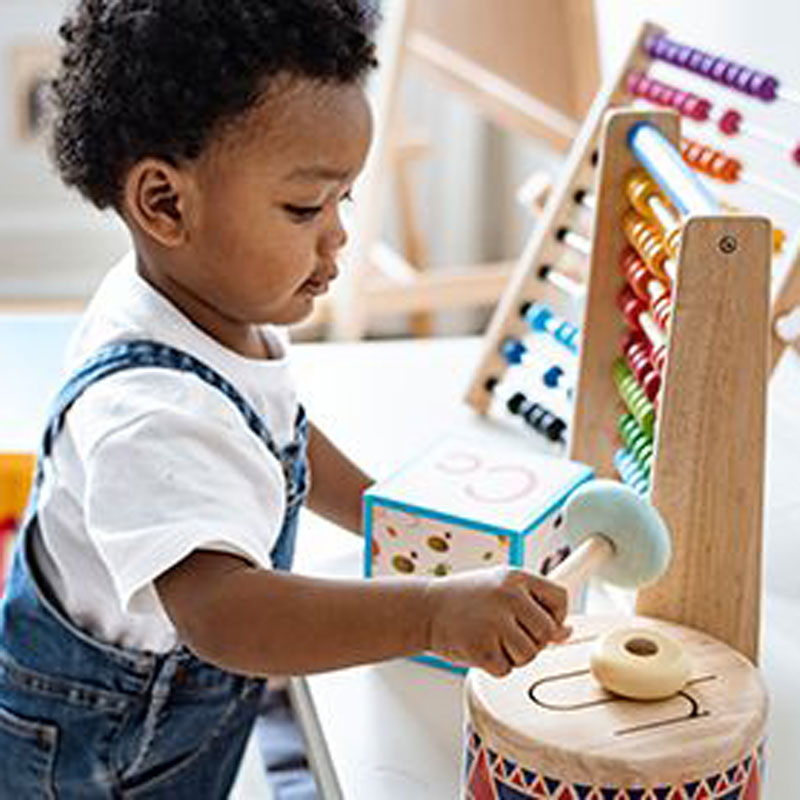 toddler playing with blocks