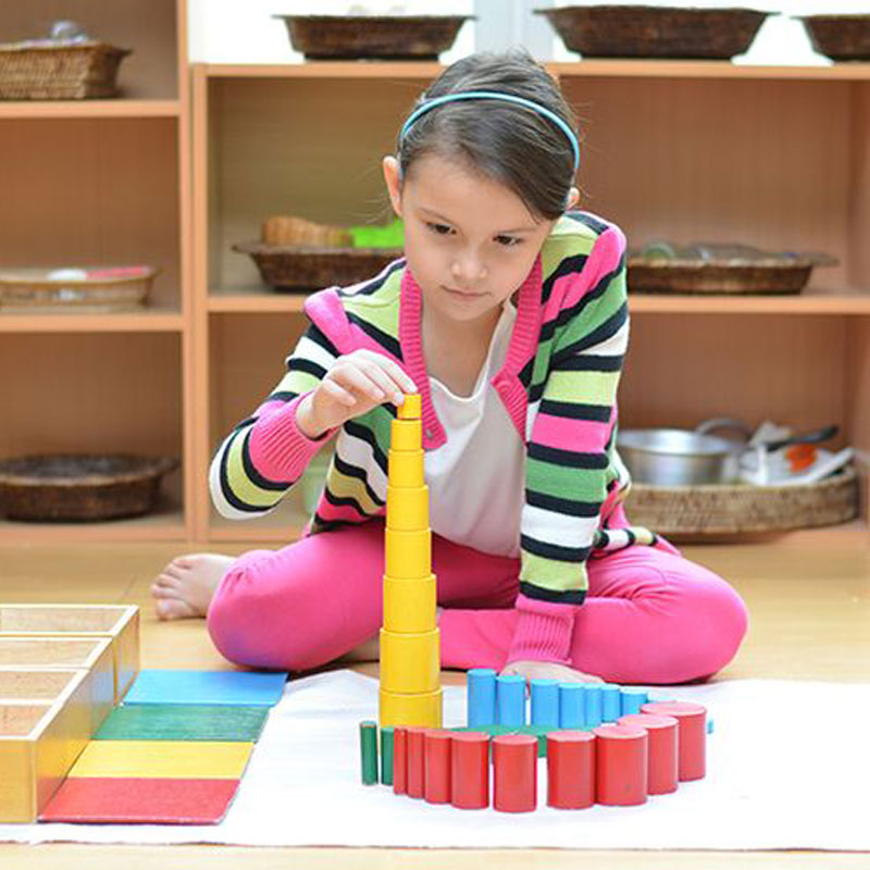kid stacking blocks